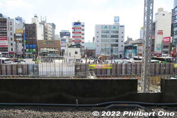 JR Shin-Koiwa Station south side as seen from the platform. This view will soon be gone when the new station building under construction is completed. The Lumière shopping arcade is visible.
