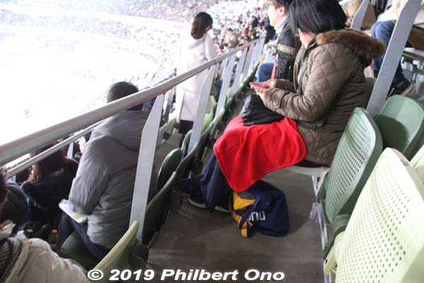 My row on the 3rd tier. Hardly any room for a person to pass in front of people sitting. 
Not good when someone wants to get out and I'm shooting video of a precious moment on the field.
Keywords: tokyo shinjuku olympic national stadium