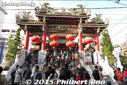 Yokohama Chinatown's main temple called Kwan Tai Temple (Kanteibyo in Japanese 関帝廟). Busy with Chinese New Year worshippers. 
Keywords: kanagawa yokohama chinatown chinese new year