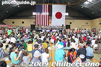 Hangar 15 had an indoor stage and food booths. A good place to sit and rest. It wasn't so hot, like I remembered before. I was told that this hangar is normally used for the C-130.
Keywords: tokyo fussa yokota united states usa air base force military japanese-american japan america friendship festival