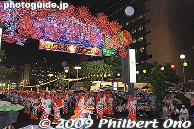 This is at the end of the parade route which had a nice illuminated gate overhead.
Keywords: yamagata hanagasa matsuri festival tohoku flower hat dancers woman girls women kimono 
